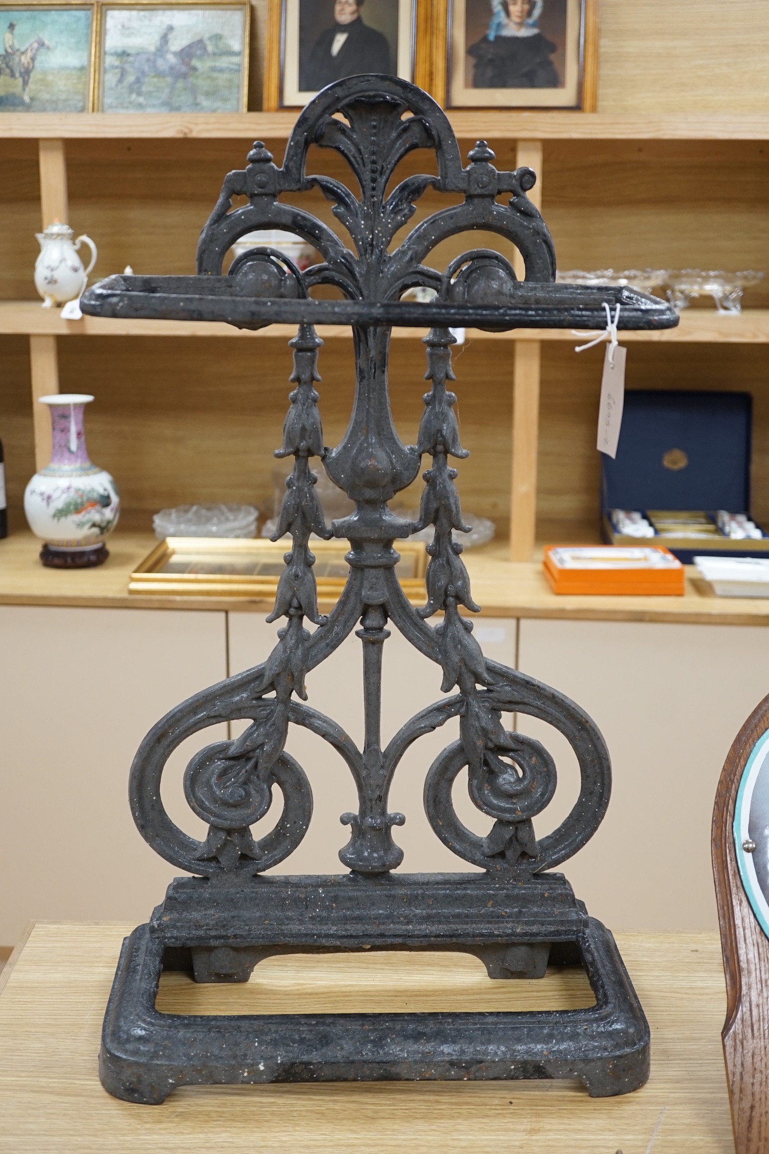 A Victorian cast iron umbrella stand, lacking tray to base, 72.5 cms high